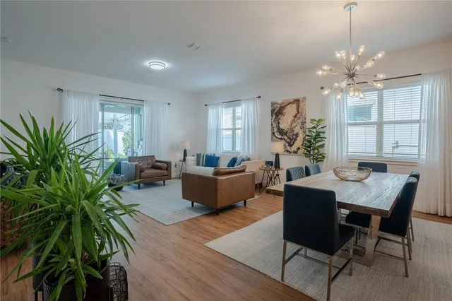 a bedroom with a bed and a night stand