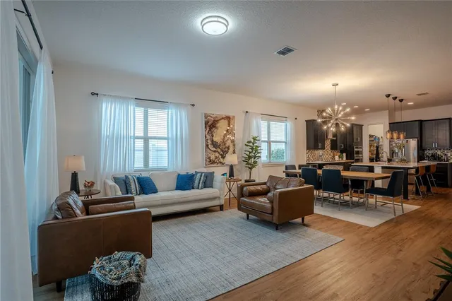 a bedroom with a bed and a mirror