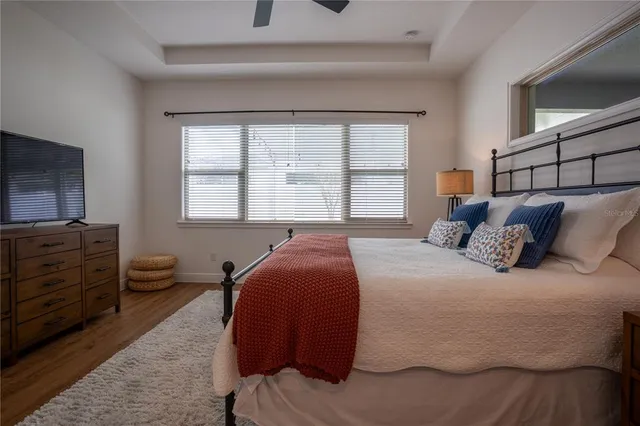 a view of a porch with a table and chairs