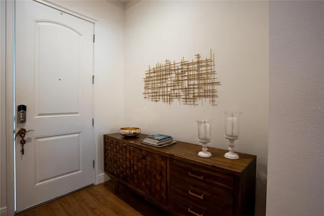 a kitchen with kitchen island stainless steel appliances a sink stove and refrigerator