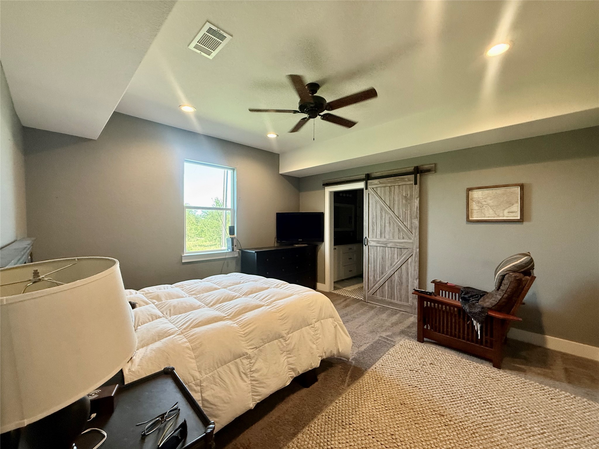 739 Pleasant Grove Road Elgin, TX 78621 - Photo 13 of 29 Bedroom featuring a wood-finish ceiling fan, recessed lighting, and a window with exterior visibility