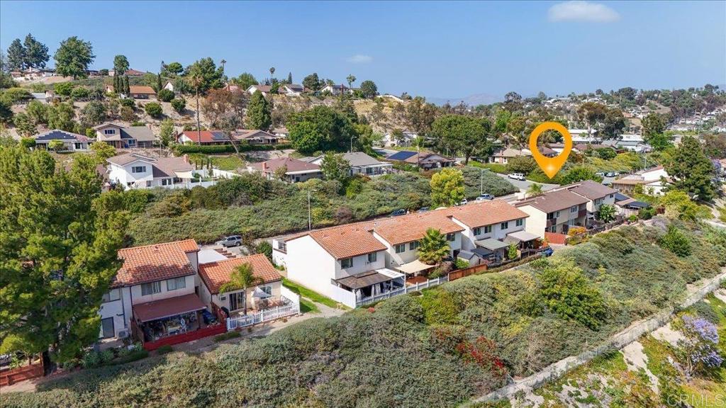 3047 Highlands Boulevard Spring Valley, CA 91977 - Photo 37 of 39 an aerial view of a house with a yard swimming pool and outdoor seating