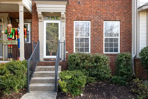 a front view of a multi story residential apartment building