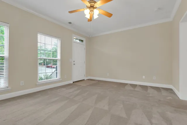 a kitchen with counter top space appliances and cabinets