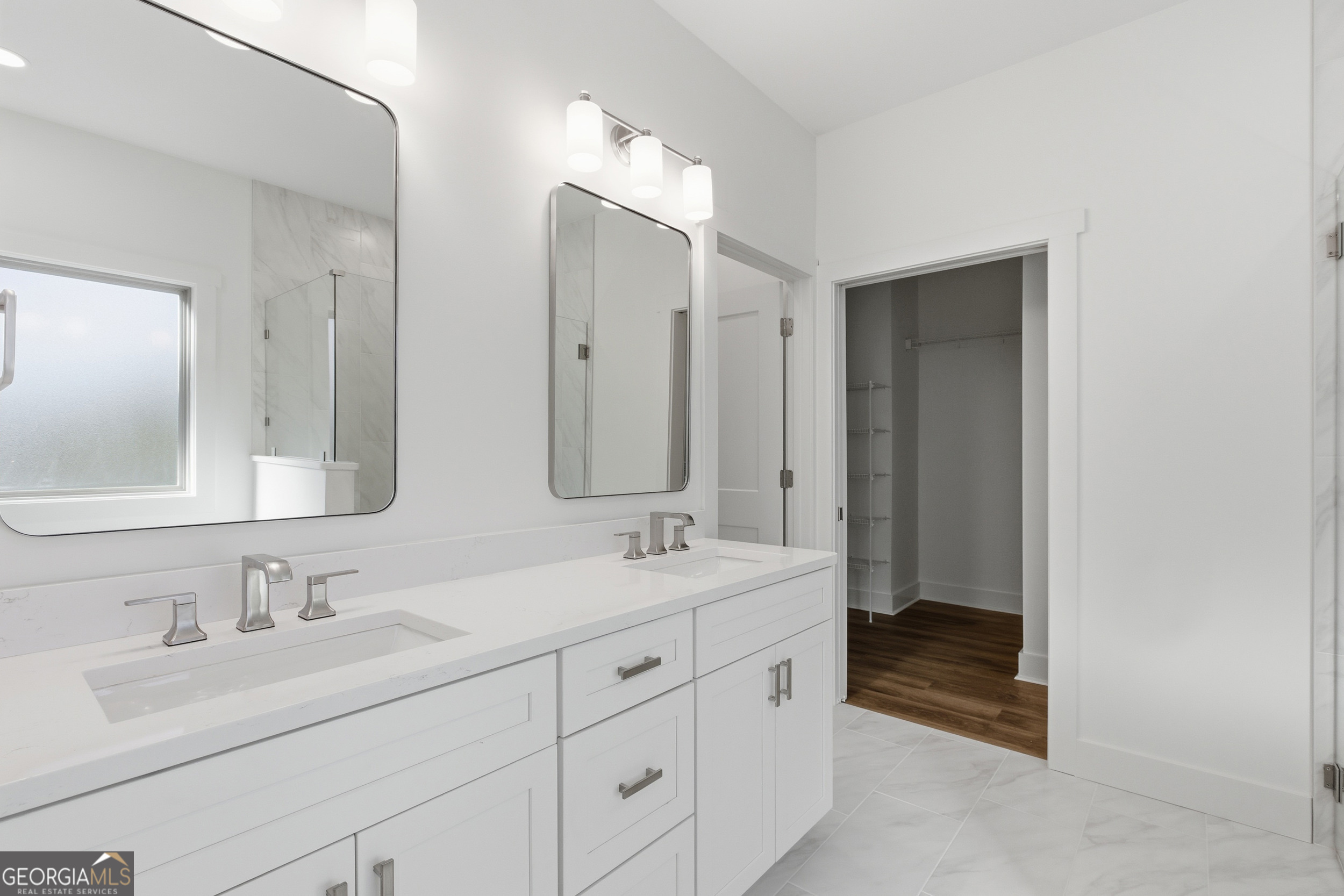 259 West Currahee Street Toccoa, GA 30577 - Photo 26 of 47 a bathroom with double sink and a mirror