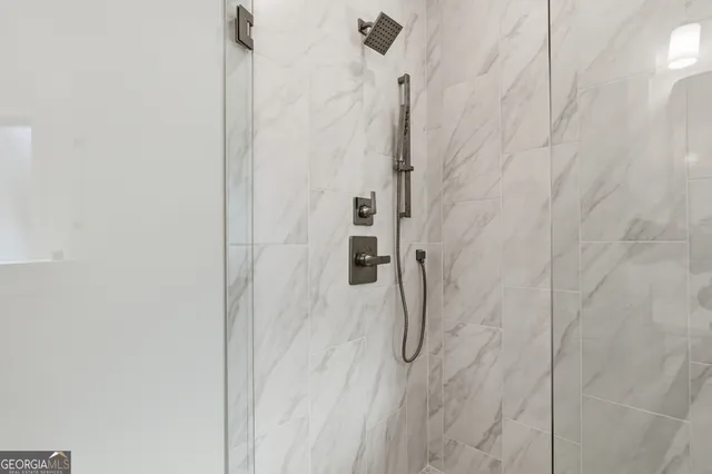 a close view of a sink a faucet and appliance in the kitchen