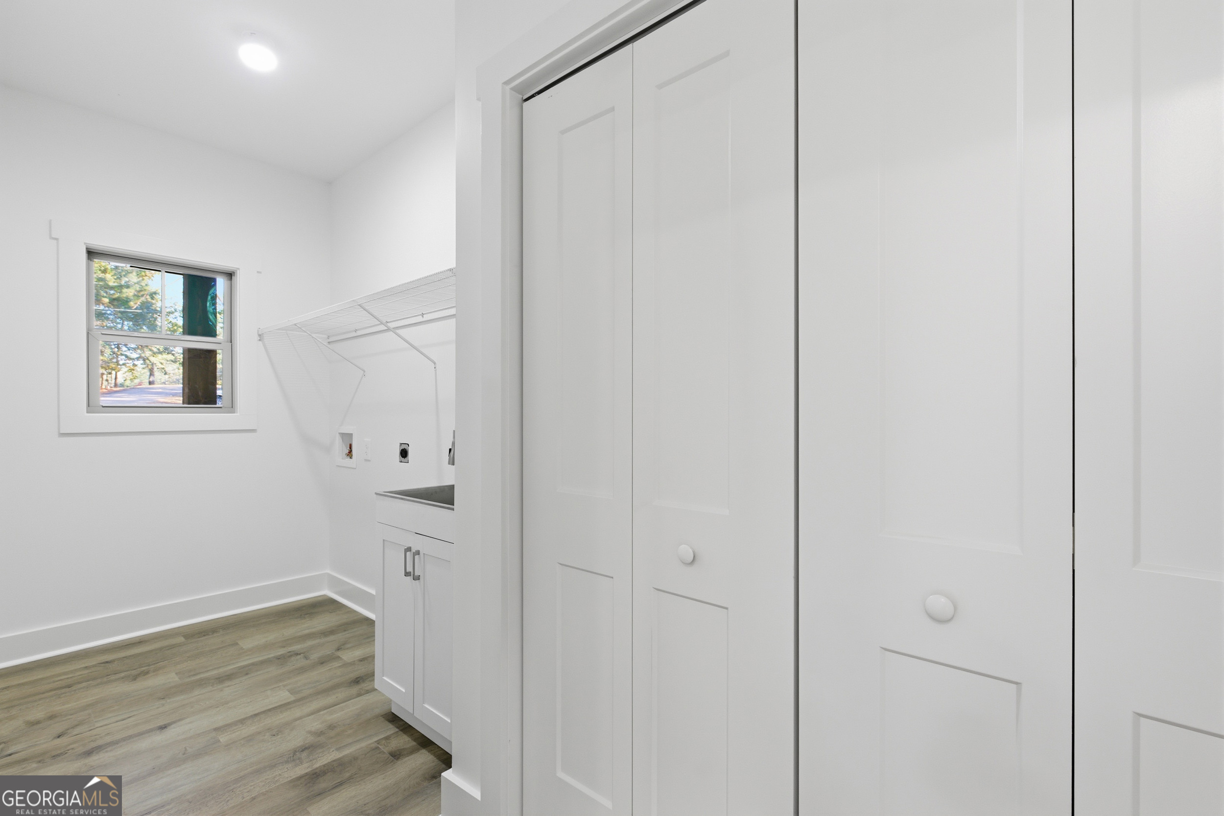 259 West Currahee Street Toccoa, GA 30577 - Photo 29 of 47 a view of empty room with wooden floor