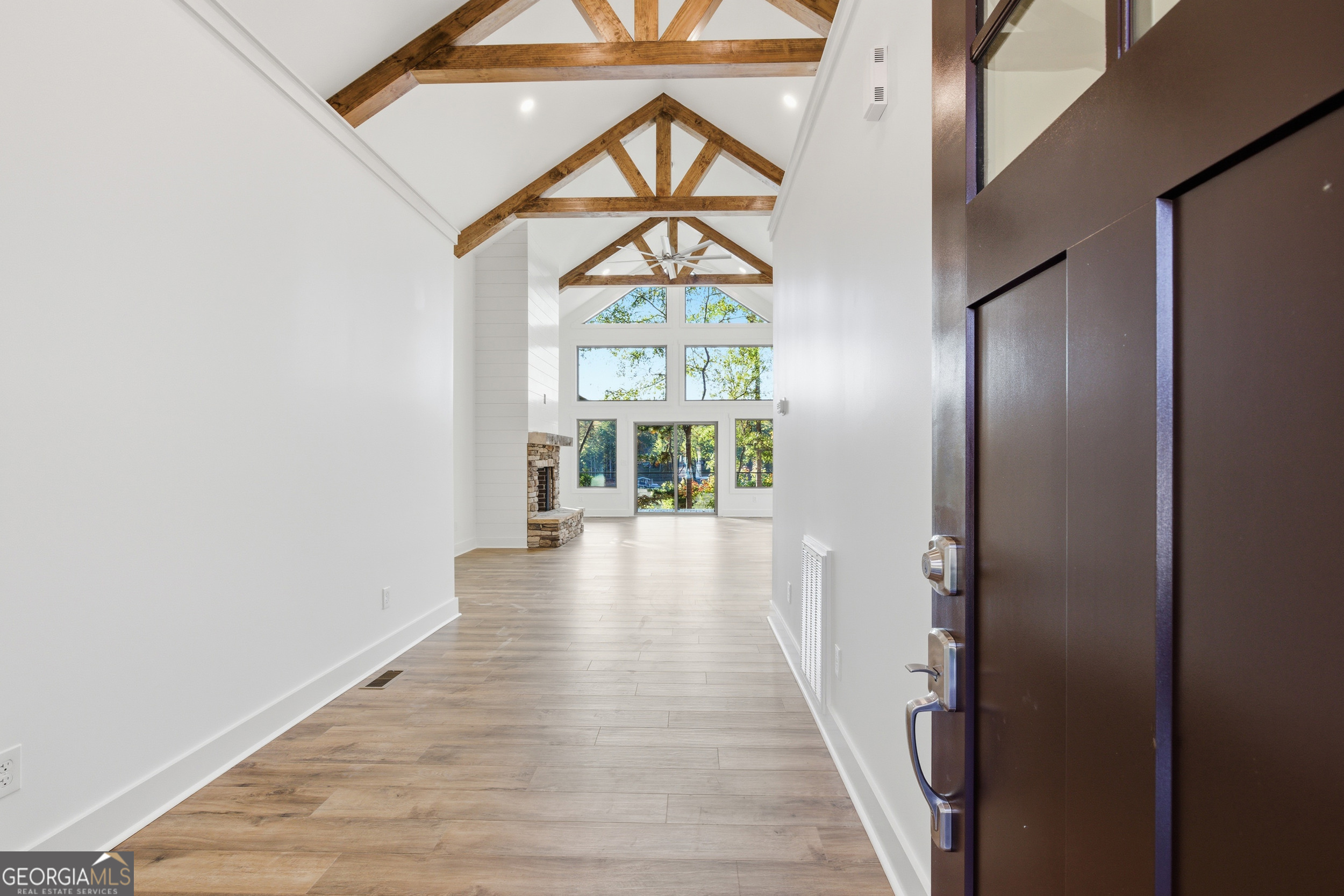259 West Currahee Street Toccoa, GA 30577 - Photo 4 of 47 a view of hallway with wooden floor and a window