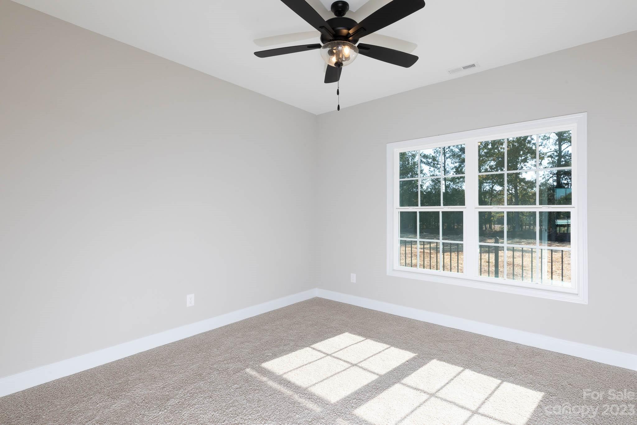 4639 Simpson Road Edgemoor, SC 29712 - Photo 15 of 30 an empty room with a window