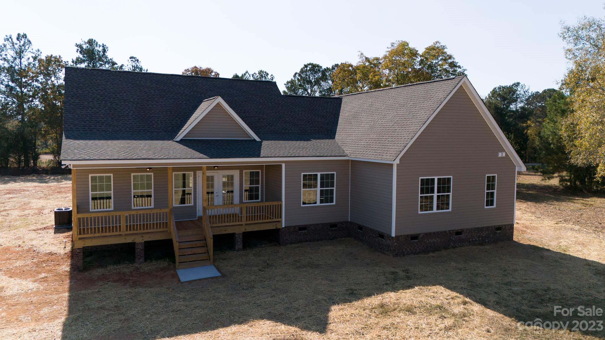 4639 Simpson Road Edgemoor, SC 29712 - Photo 28 of 30 a front view of a house with a garden