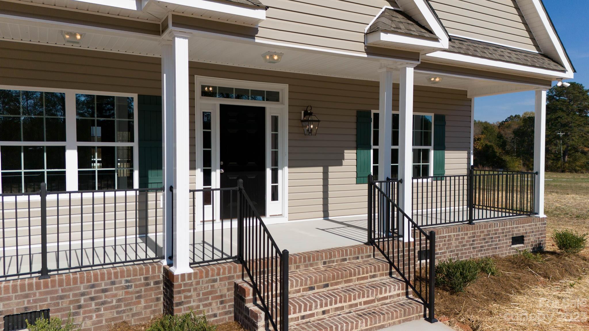 4639 Simpson Road Edgemoor, SC 29712 - Photo 29 of 30 a view of a house with a glass door