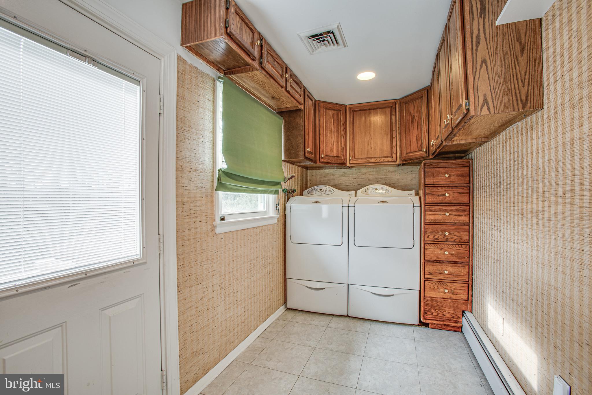 1411 Devils Reach Road Woodbridge, VA 22192 - Photo 14 of 76 Big laundry room off of kitchen, tons of storage