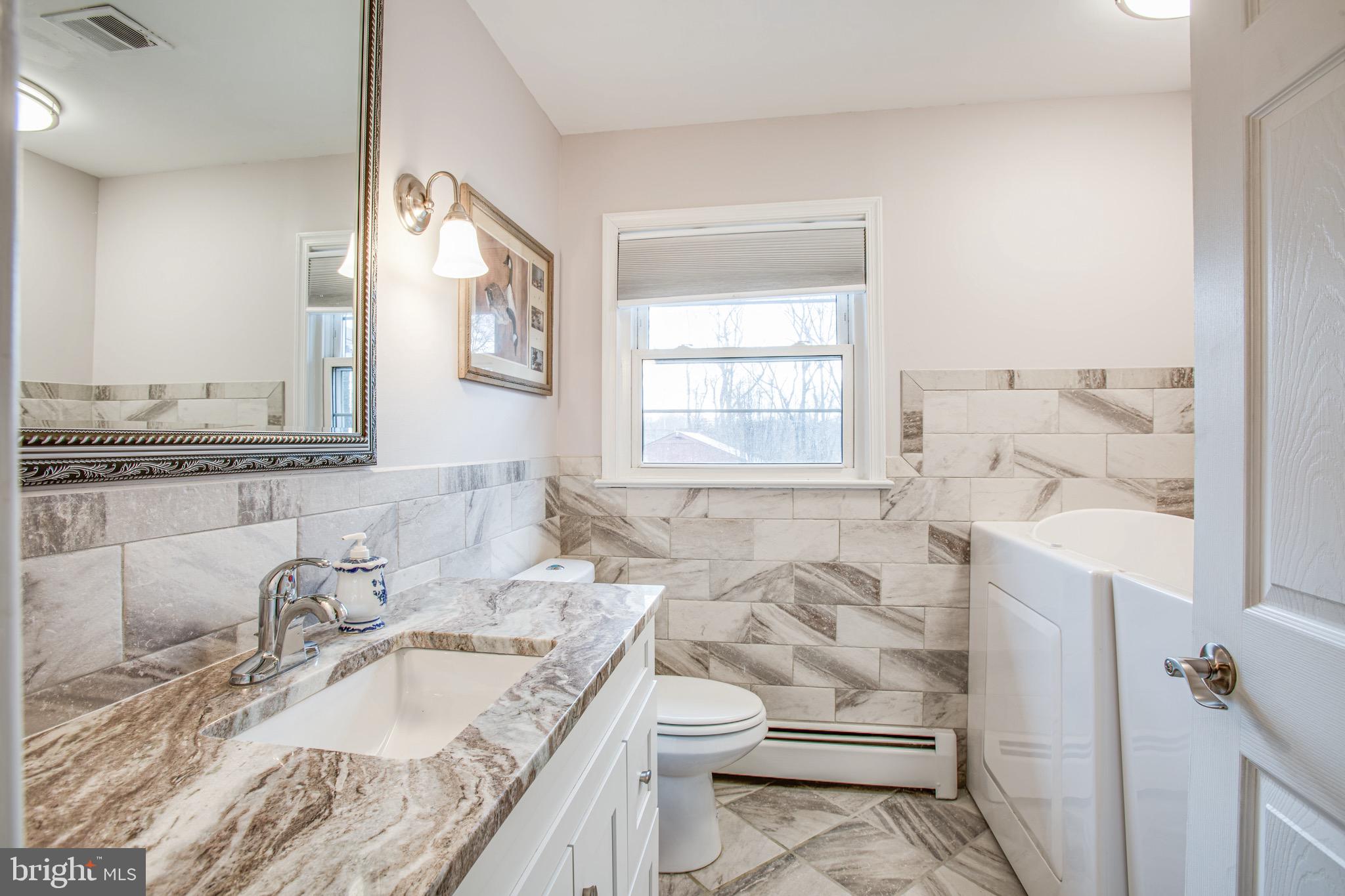 1411 Devils Reach Road Woodbridge, VA 22192 - Photo 18 of 76 Beautiful updated bathroom