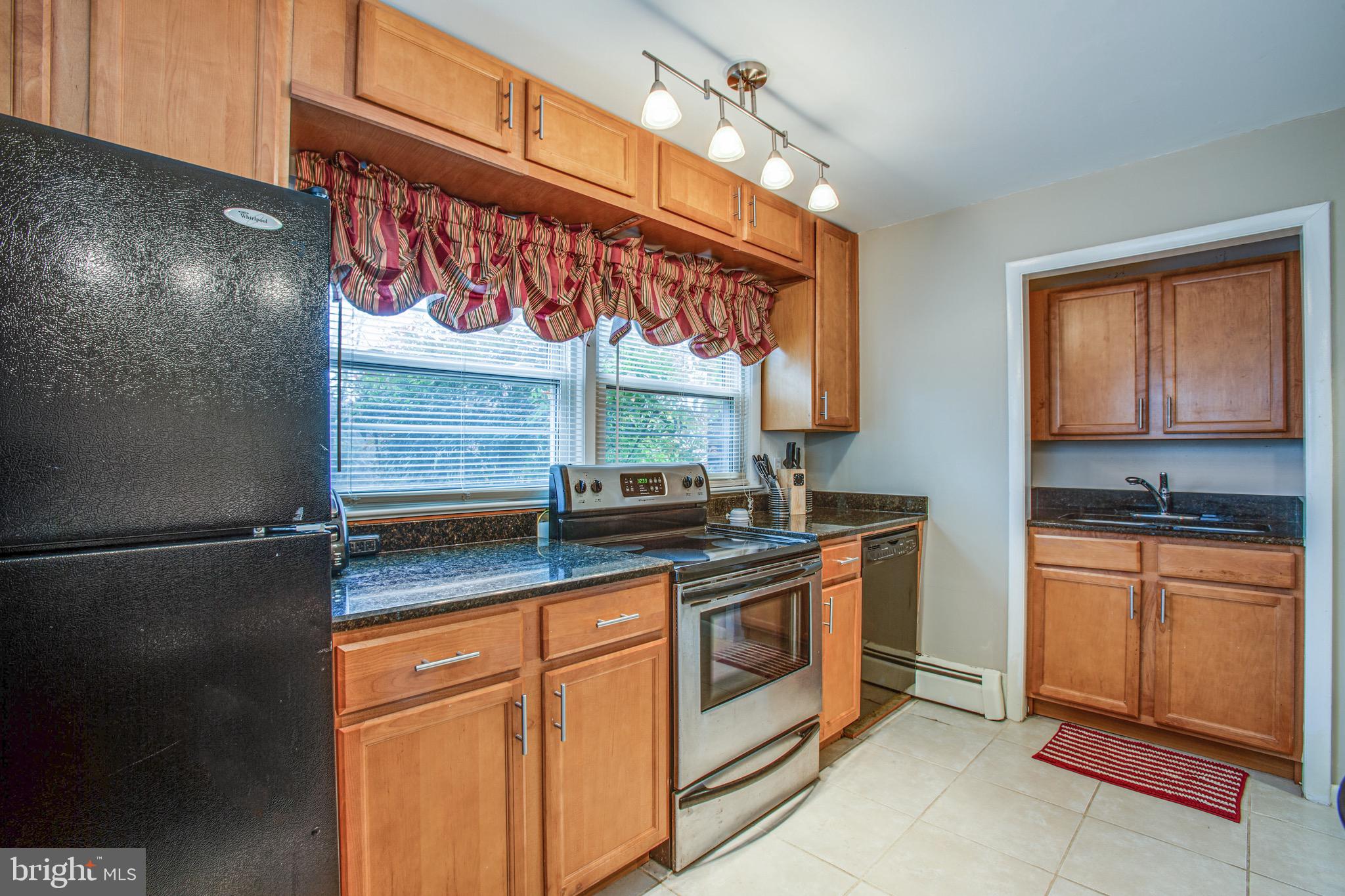 1411 Devils Reach Road Woodbridge, VA 22192 - Photo 31 of 76 Lots of cabinets and counter space lower kitchen