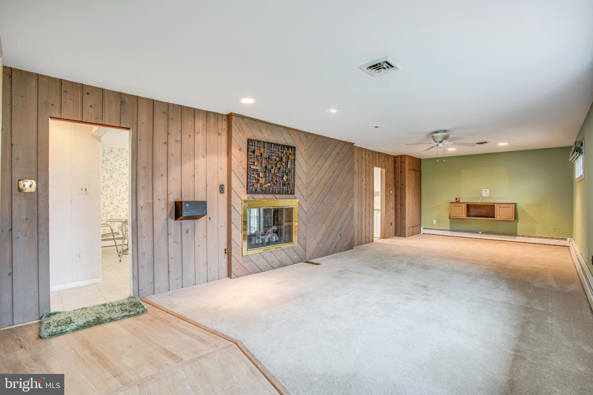 1411 Devils Reach Road Woodbridge, VA 22192 - Photo 6 of 76 DBL sided fireplace that shares with kitchen
