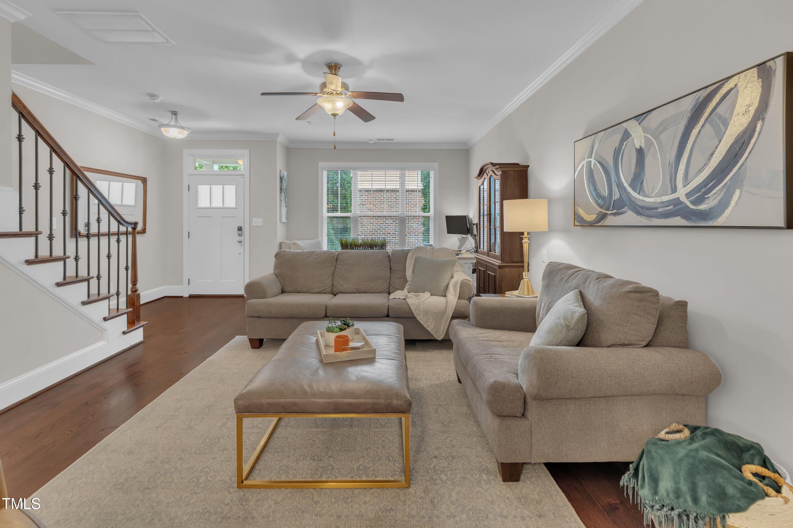 540 Ledbetter Court Raleigh, NC 27608 - Photo 12 of 40 a living room with furniture and a window