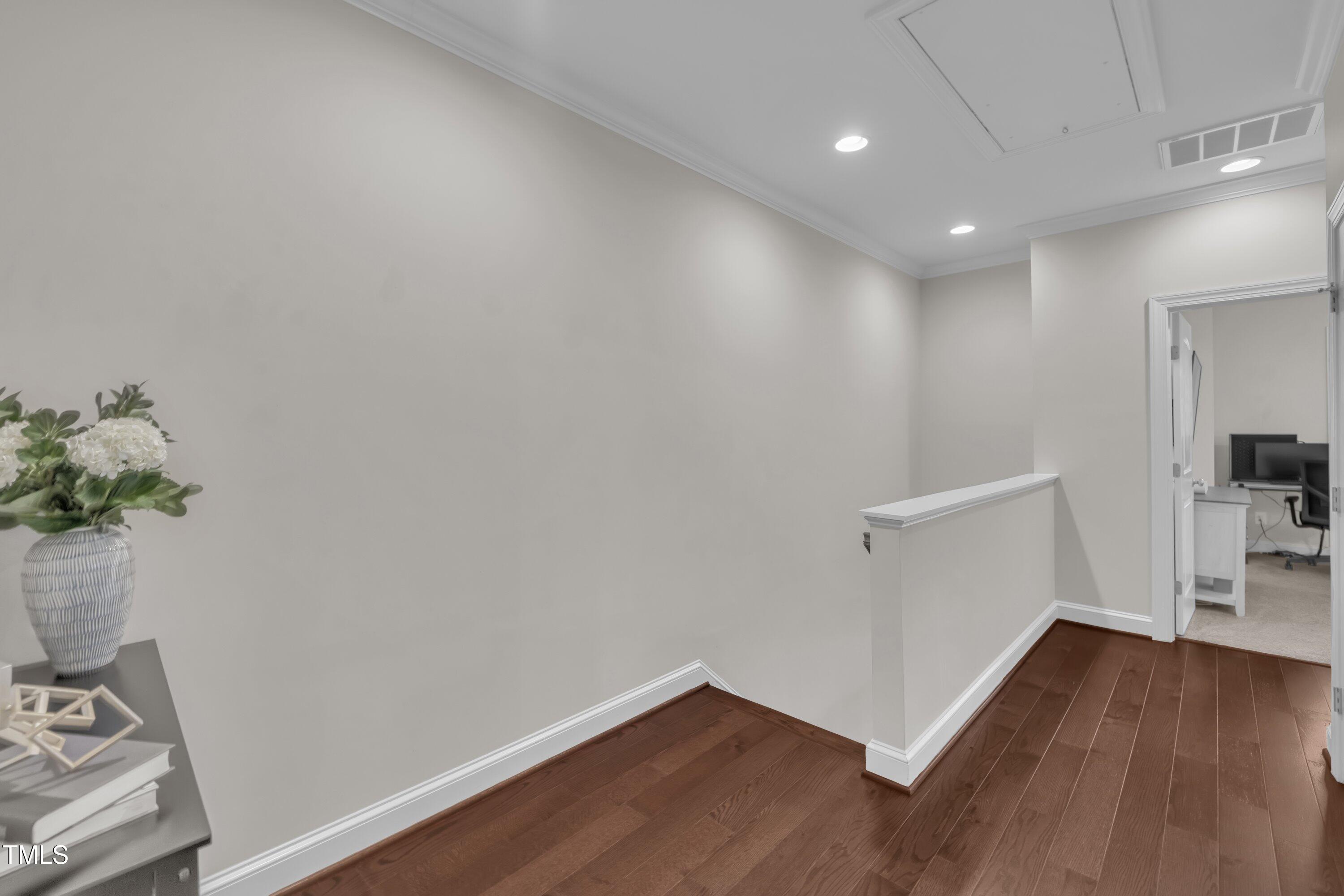 540 Ledbetter Court Raleigh, NC 27608 - Photo 22 of 40 a view of empty room with wooden floor