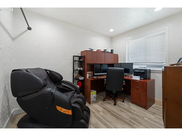 a room with furniture and wooden floor