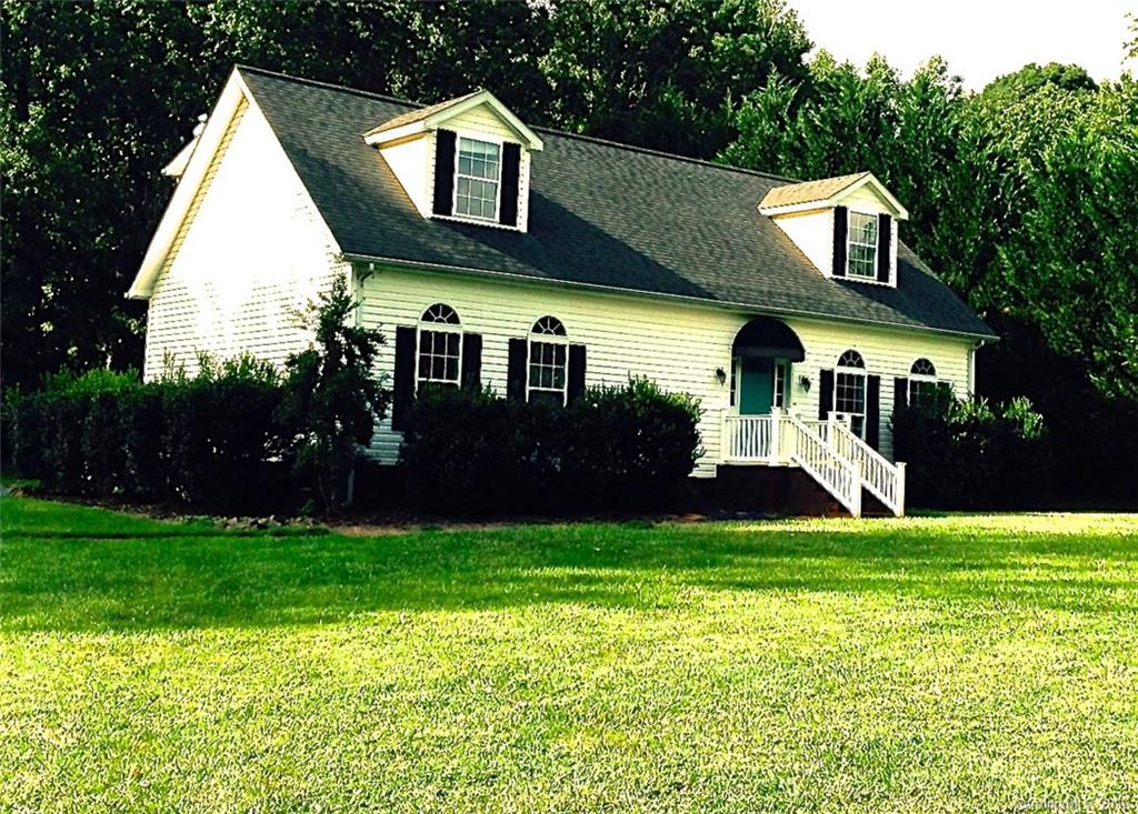 49487 Quail Trail Road Norwood, NC 28128 - Photo 1 of 24 a view of a house with a yard