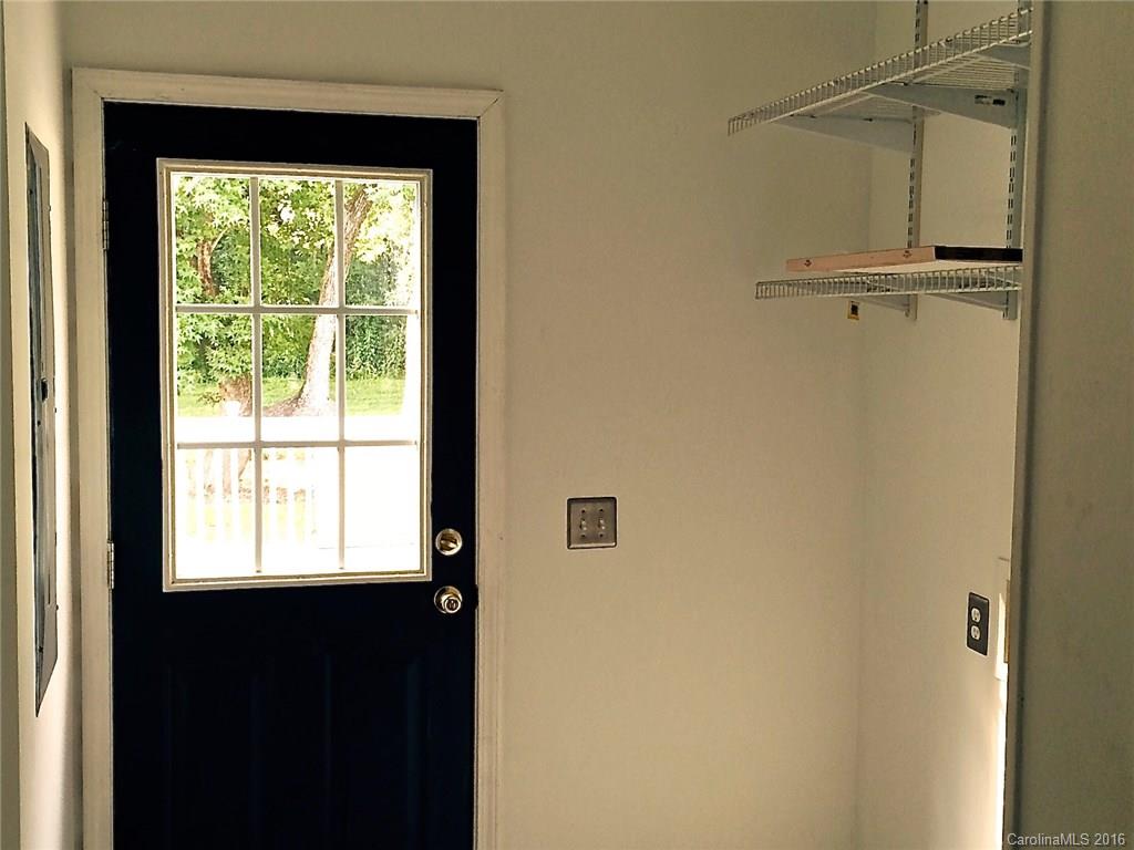 49487 Quail Trail Road Norwood, NC 28128 - Photo 17 of 24 a view of a front door