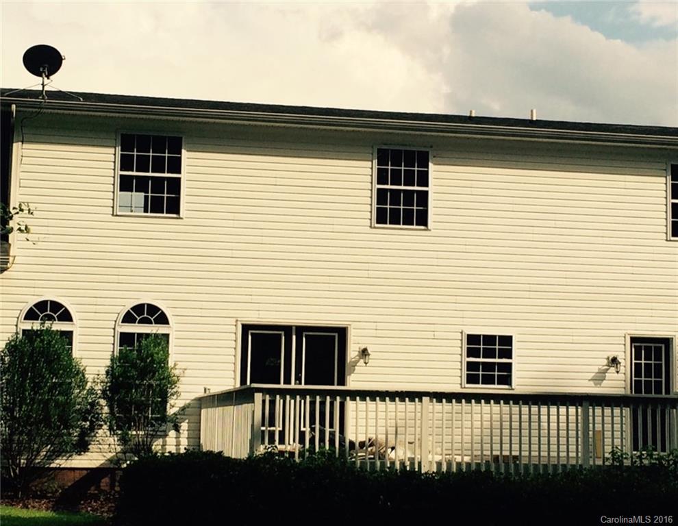 49487 Quail Trail Road Norwood, NC 28128 - Photo 23 of 24 a view of a house with a balcony
