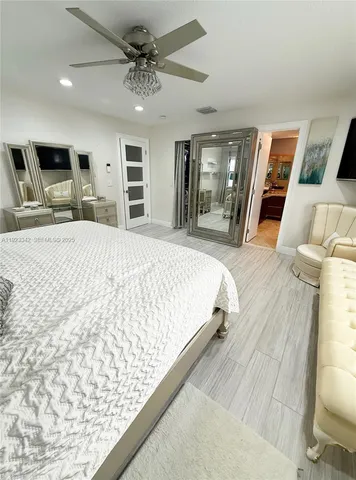 a kitchen with a sink and a stove top oven