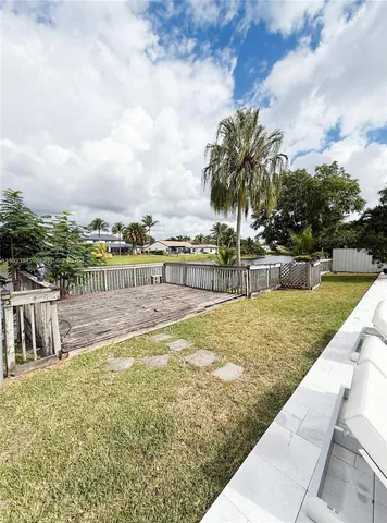 a view of swimming pool from a balcony