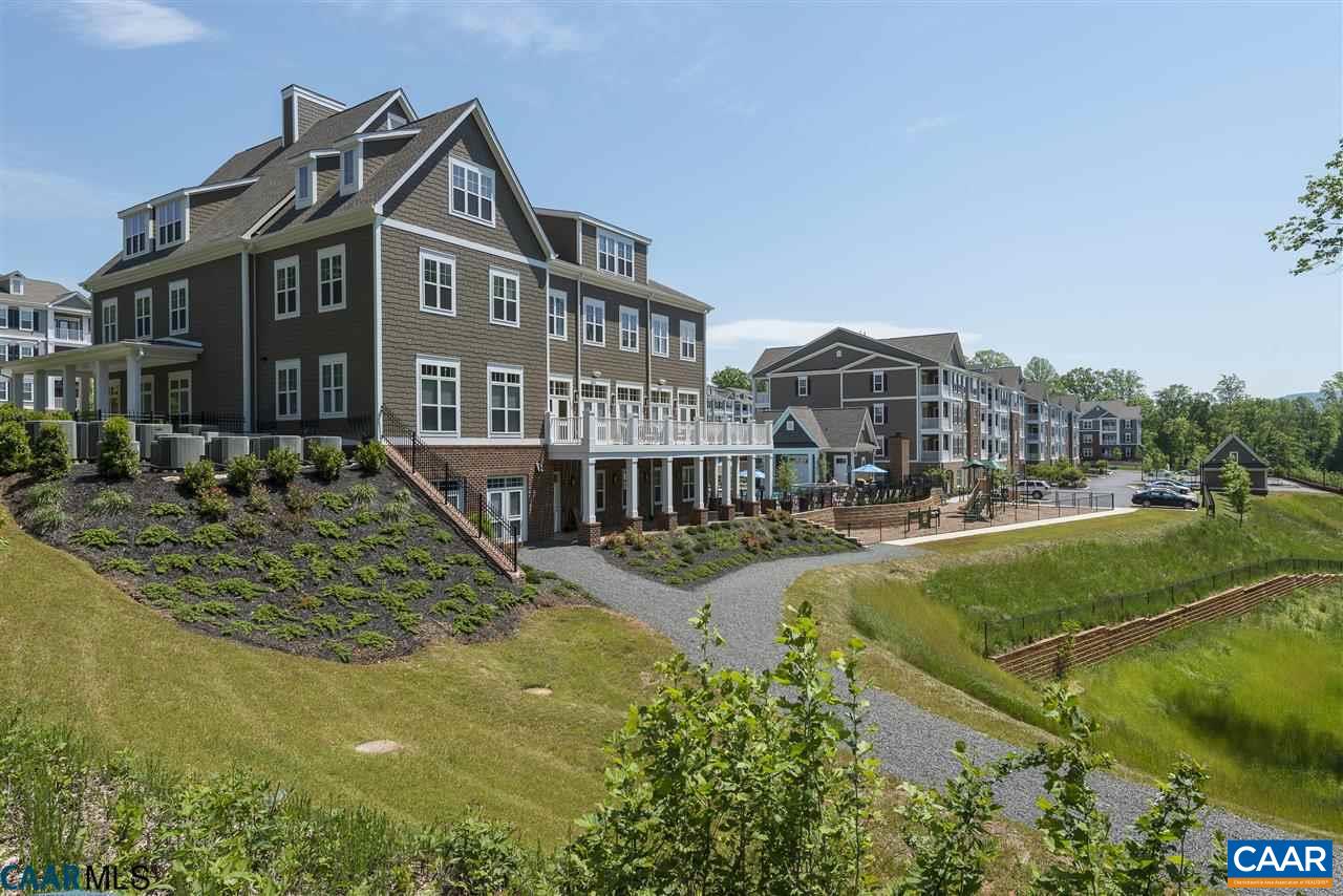200 Reserve Boulevard, Unit B Charlottesville, VA 22901 - Photo 4 of 13 a view of residential houses with yard and lake view