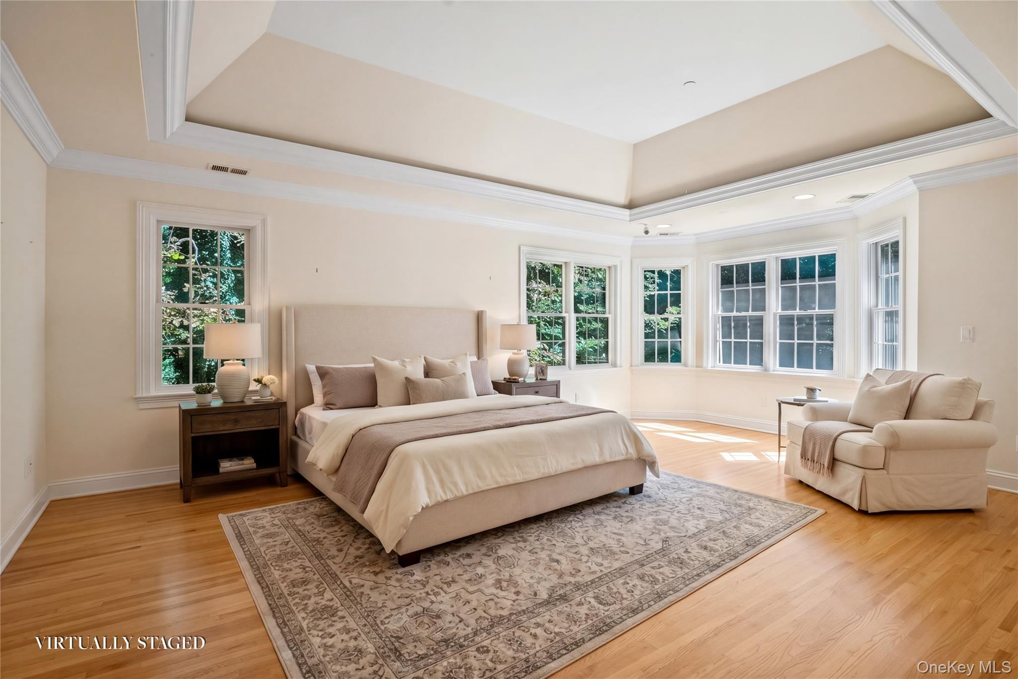 25 Riverview Road Irvington, NY 10533 - Photo 27 of 41 Virtual staging. Primary room with two walk in closets, tray ceiling and spacious master bath.