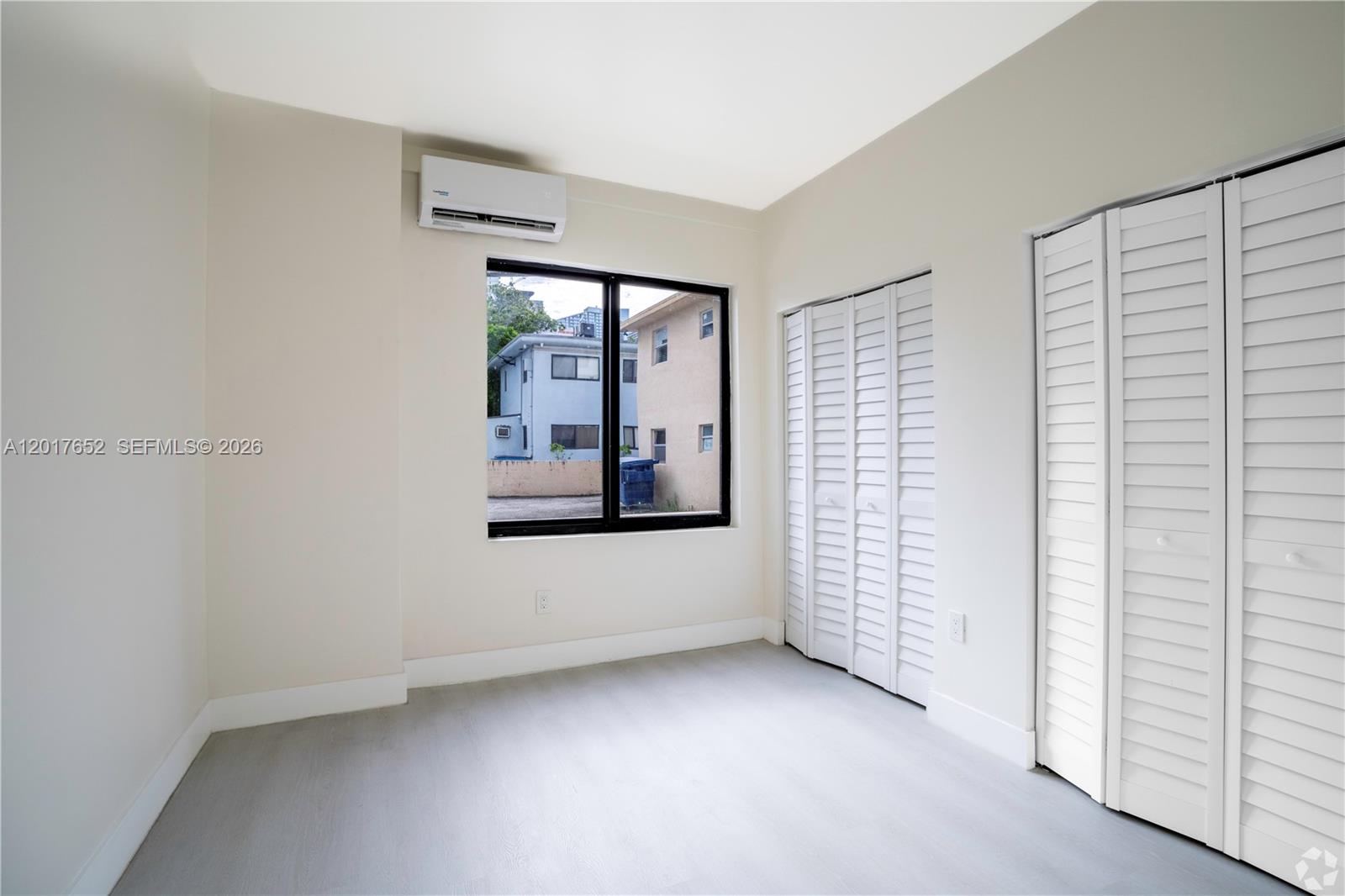 433 Southwest 6th Street, Unit 15 Miami, FL 33130 - Photo 12 of 12 a view of an empty room with a window