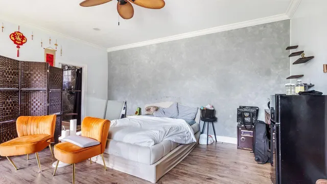 a bed room with a bed and furniture