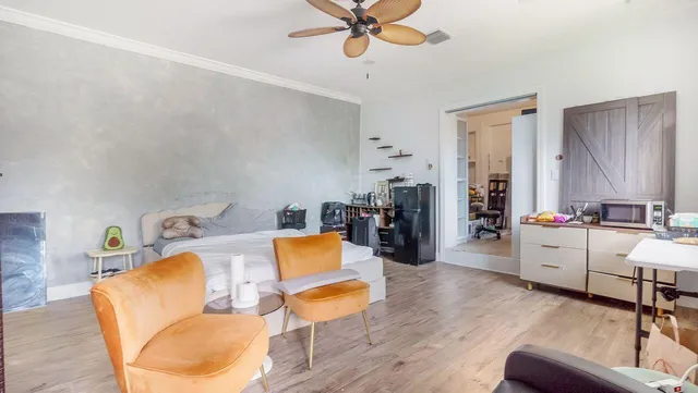 a bathroom with a toilet and a sink