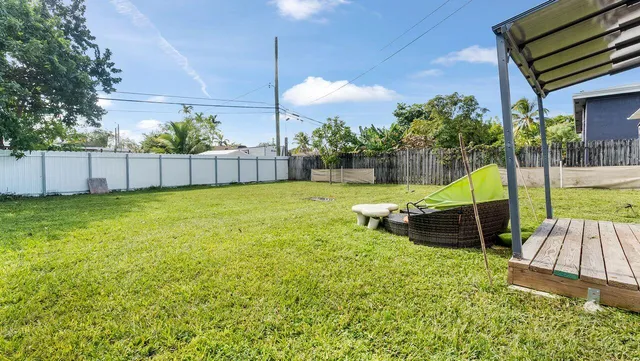 a view of a backyard with a slide