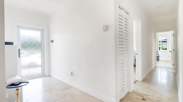 a room that has a table and chairs in it