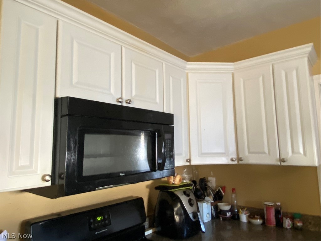 3687 Normandy Road Shaker Heights, OH 44120 - Photo 12 of 15 Kitchen cabinets enclose built in microwave