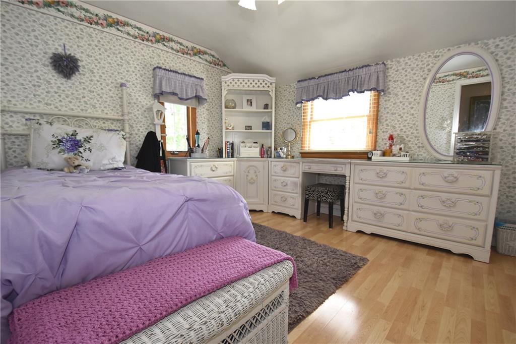 541 Haverhill Road Pittsburgh, PA 15228 - Photo 14 of 28 a bedroom with a bed and a fireplace