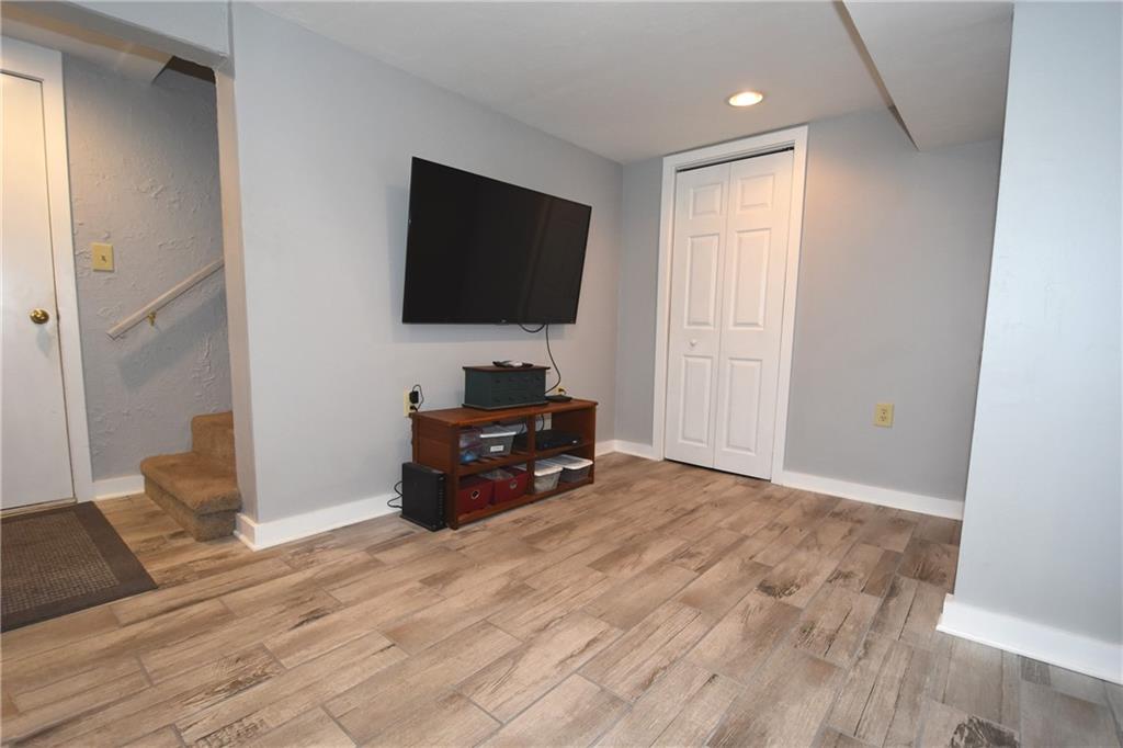 541 Haverhill Road Pittsburgh, PA 15228 - Photo 17 of 28 a room with wooden floor and furniture