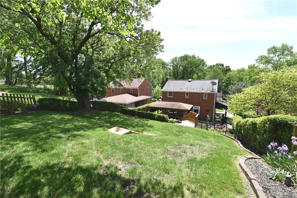 541 Haverhill Road Pittsburgh, PA 15228 - Photo 22 of 28 a view of a garden with a bench