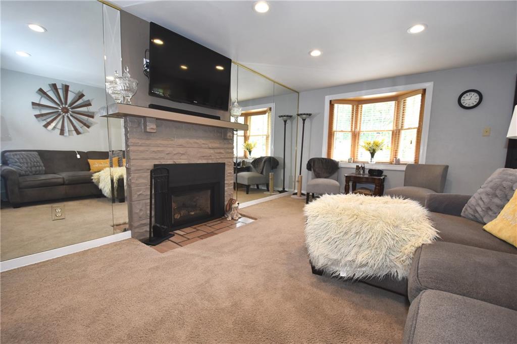 541 Haverhill Road Pittsburgh, PA 15228 - Photo 9 of 28 a living room with furniture and a fireplace