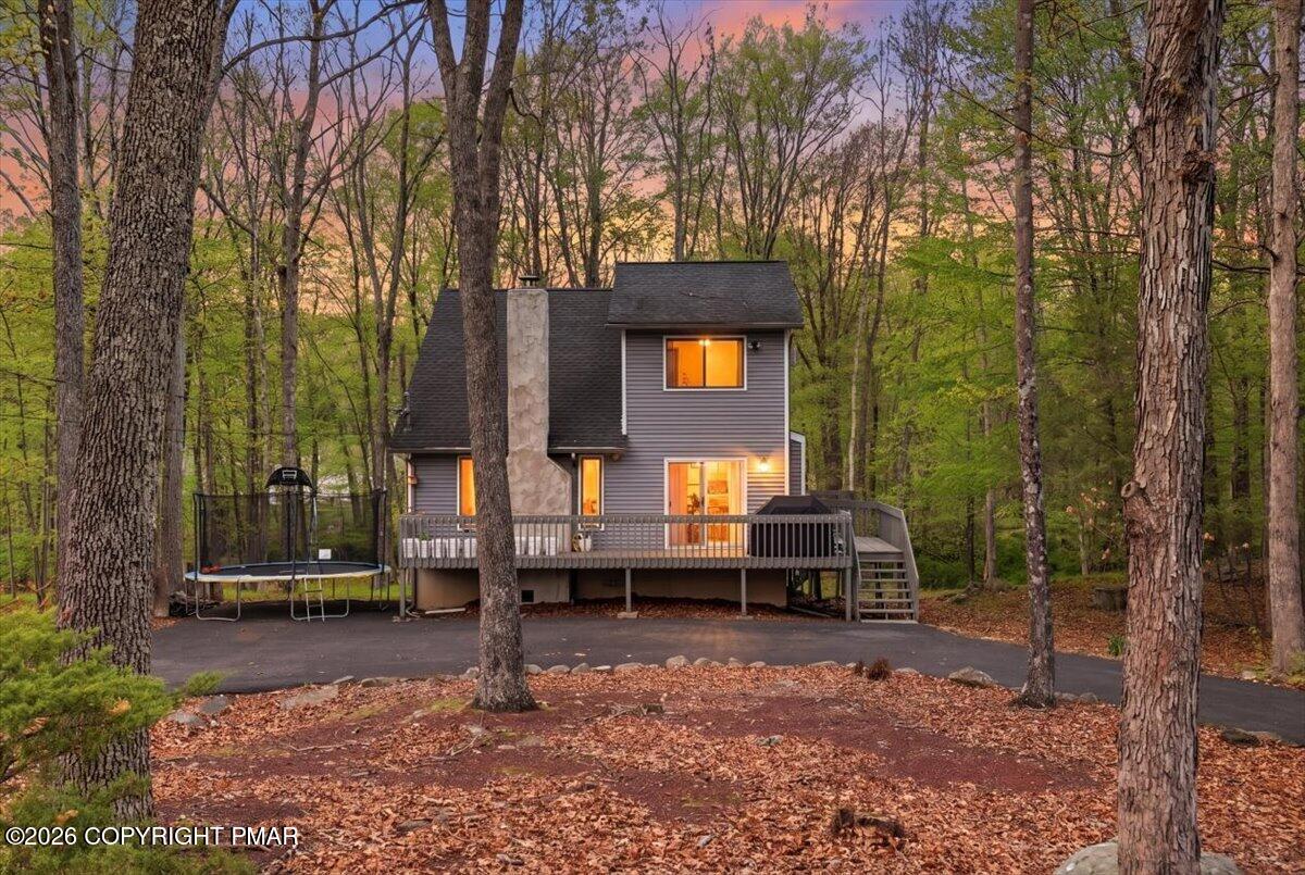 126 Dunchurch Drive Bushkill, PA 18324 - Photo 1 of 34 a backyard of a house with barbeque oven