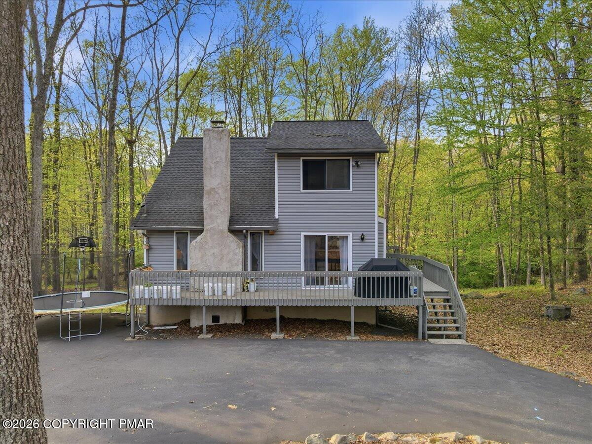 126 Dunchurch Drive Bushkill, PA 18324 - Photo 2 of 34 a view of a house with a bed and chair