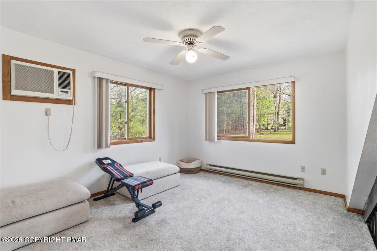 126 Dunchurch Drive Bushkill, PA 18324 - Photo 24 of 34 a living room with furniture and a window
