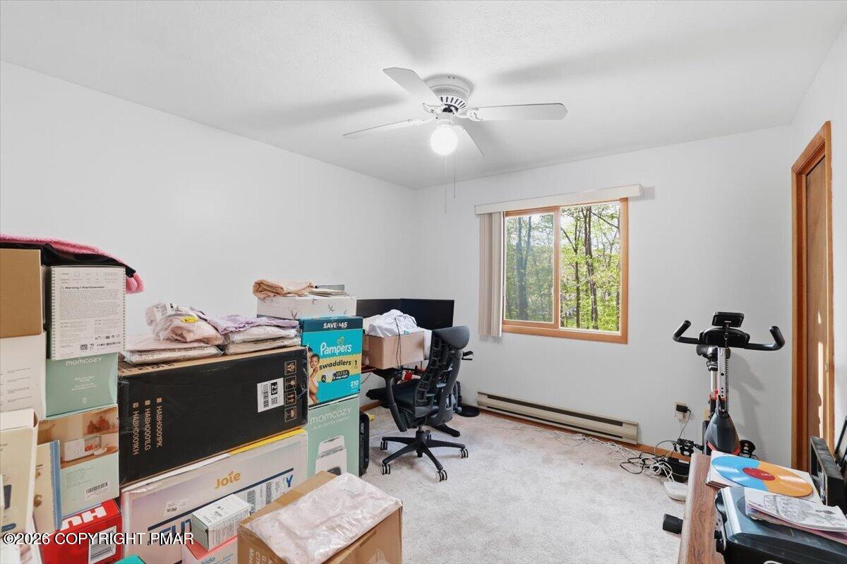 126 Dunchurch Drive Bushkill, PA 18324 - Photo 29 of 34 a view of a workspace with furniture and a window