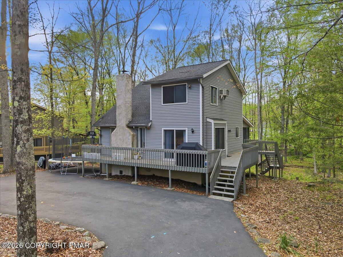 126 Dunchurch Drive Bushkill, PA 18324 - Photo 3 of 34 a view of a house with a yard and sitting area