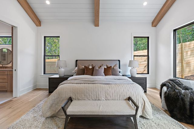 a building outdoor space with patio furniture and potted plants