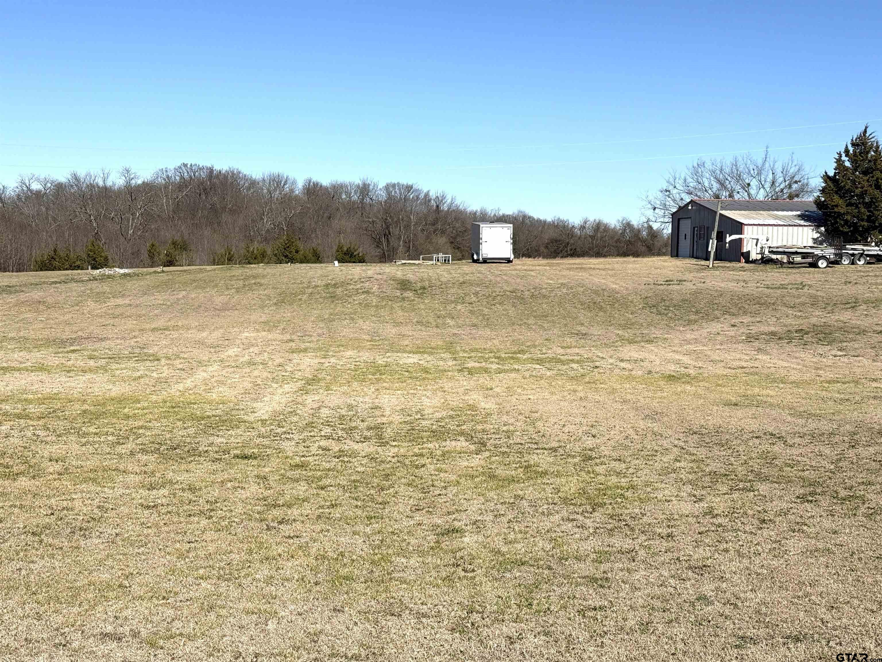 18445 Farm To Market 137 Roxton, TX 75477 - Photo 6 of 7 a view of a lake view