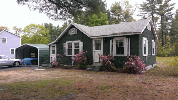 44 Turnpike Road Townsend, MA 01469 - Photo 3 of 13 a front view of a house with garden