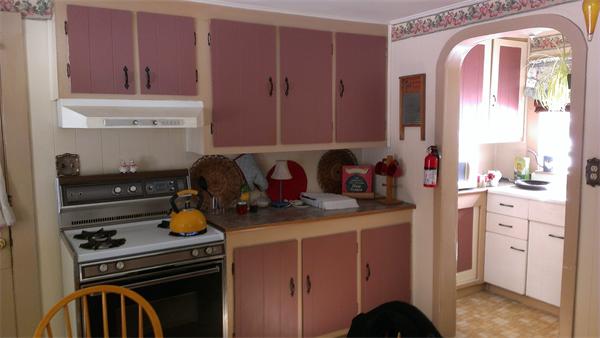 44 Turnpike Road Townsend, MA 01469 - Photo 7 of 13 a kitchen with a stove a sink and cabinets