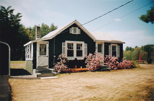 44 Turnpike Road Townsend, MA 01469 - Photo 10 of 13 a front view of a house with a yard