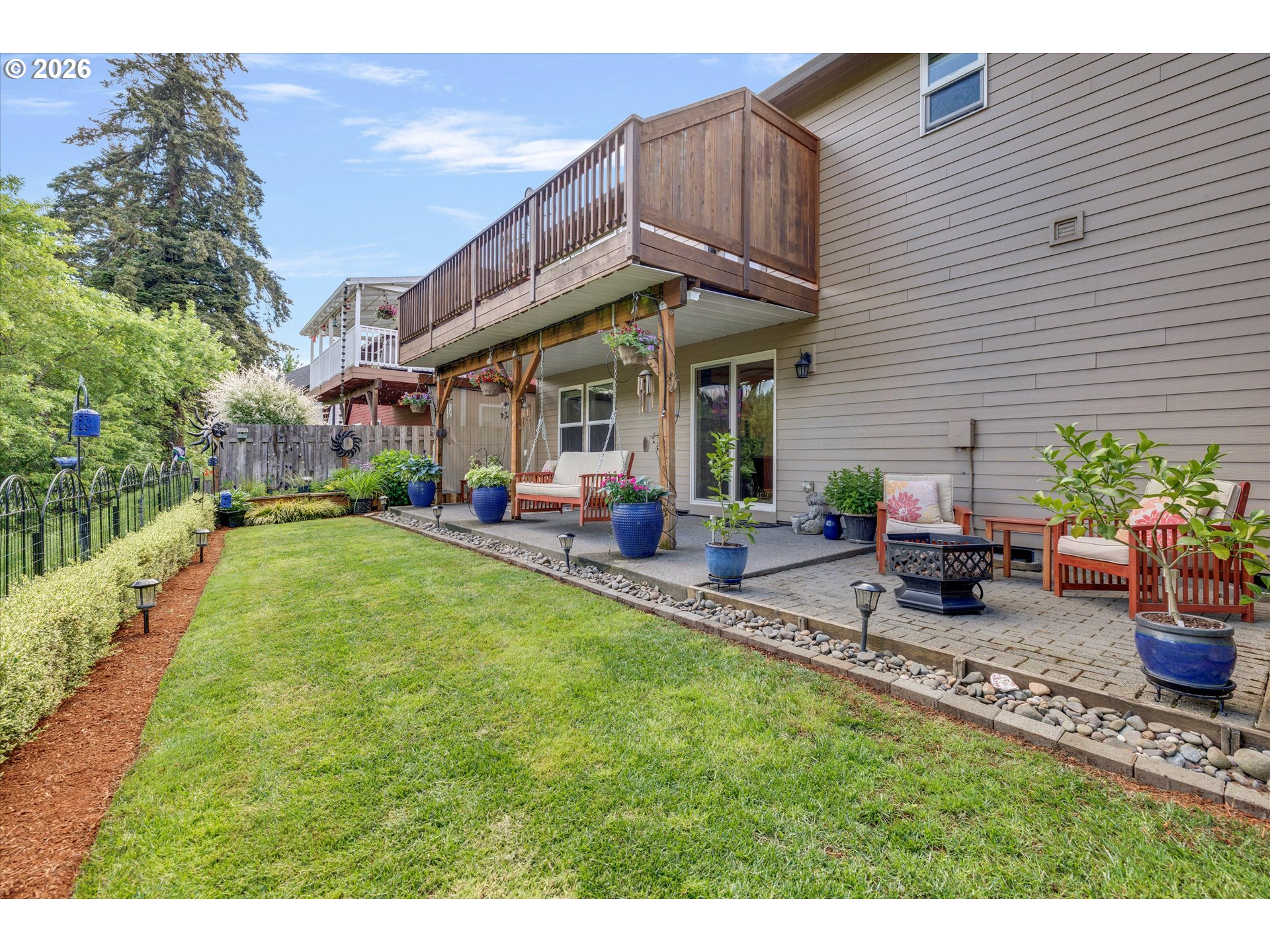 3769 10th Street Hubbard, OR 97032 - Photo 43 of 47 a view of a house with backyard and sitting area